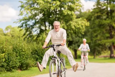 Happy retired couple biking outdoors, enjoying FERS benefits for a secure retirement.