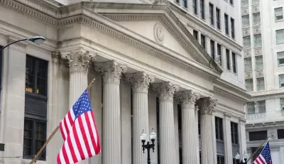 Federal building with American flags, representing Federal Benefits.