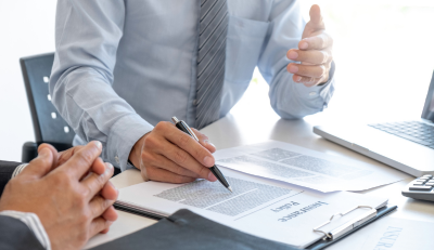 Business discussion on insurance and life insurance policies.