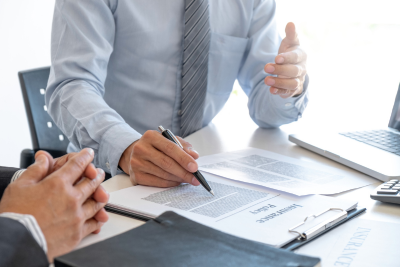 Business discussion on insurance and life insurance policies.