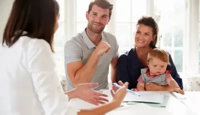 A family discussing insurance and disability options with an advisor.
