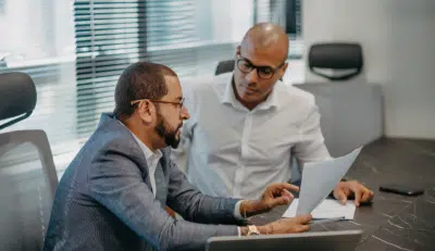 federal employee reviewing FEHB and TSP with benefits coordinator