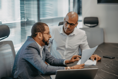 federal employee reviewing FEHB and TSP with benefits coordinator
